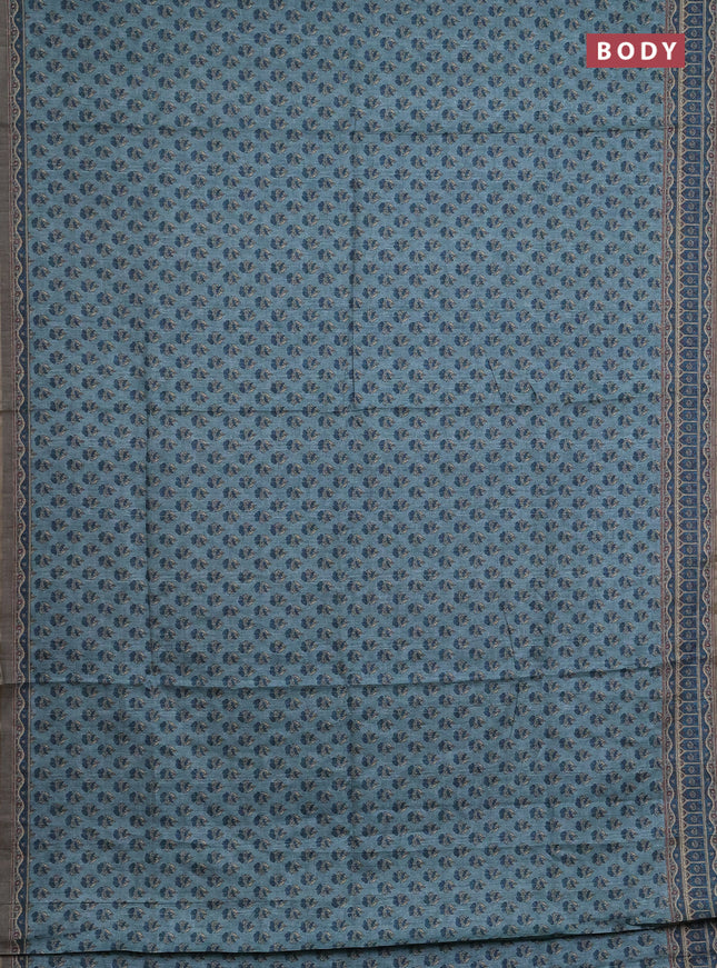 Semi tussar saree teal blue and peacock blue with allover floral buttas and printed zari woven border