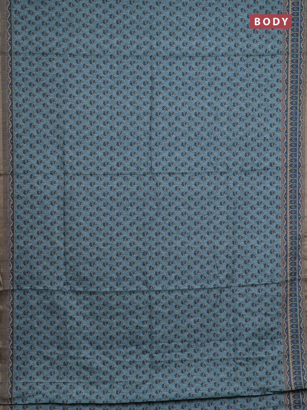 Semi tussar saree teal blue and peacock blue with allover floral buttas and printed zari woven border