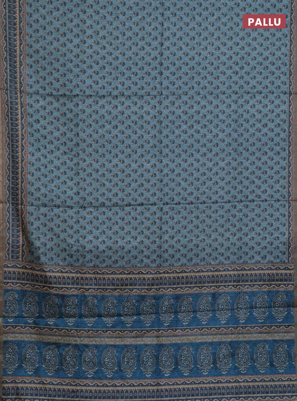 Semi tussar saree teal blue and peacock blue with allover floral buttas and printed zari woven border