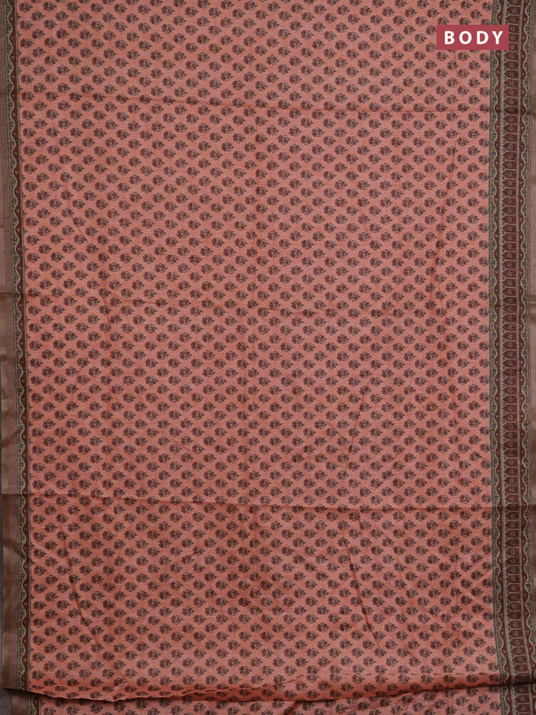 Semi tussar saree peach orange and maroon with allover floral buttas and printed zari woven border