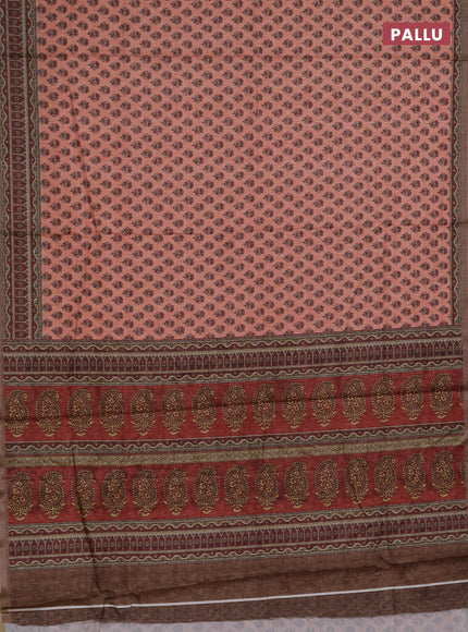 Semi tussar saree peach orange and maroon with allover floral buttas and printed zari woven border