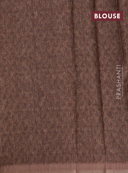 Semi tussar saree peach orange and maroon with allover floral buttas and printed zari woven border