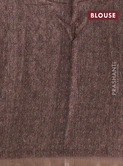 Semi tussar saree sandal and brown with allover floral buttas and printed zari woven border