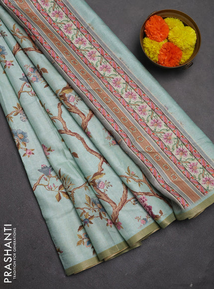 Semi tussar saree mild teal with allover floral digital prints and zari woven piping border