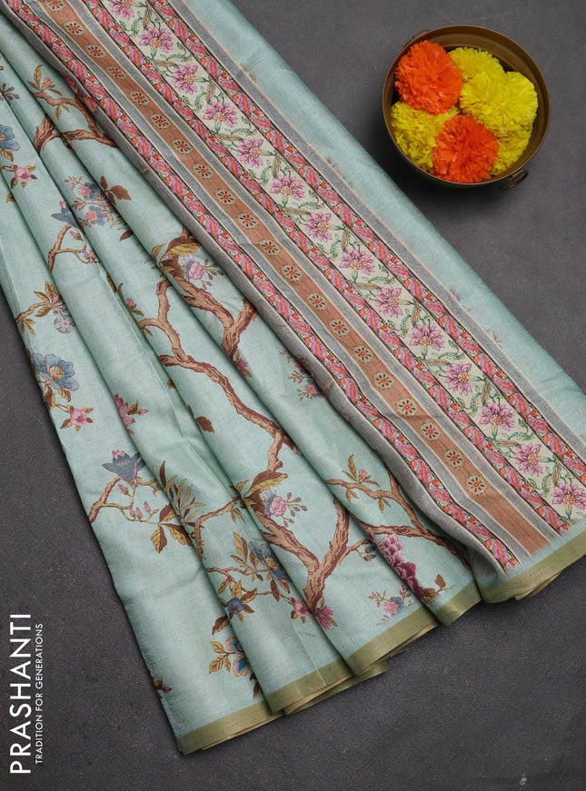 Semi tussar saree mild teal with allover floral digital prints and zari woven piping border