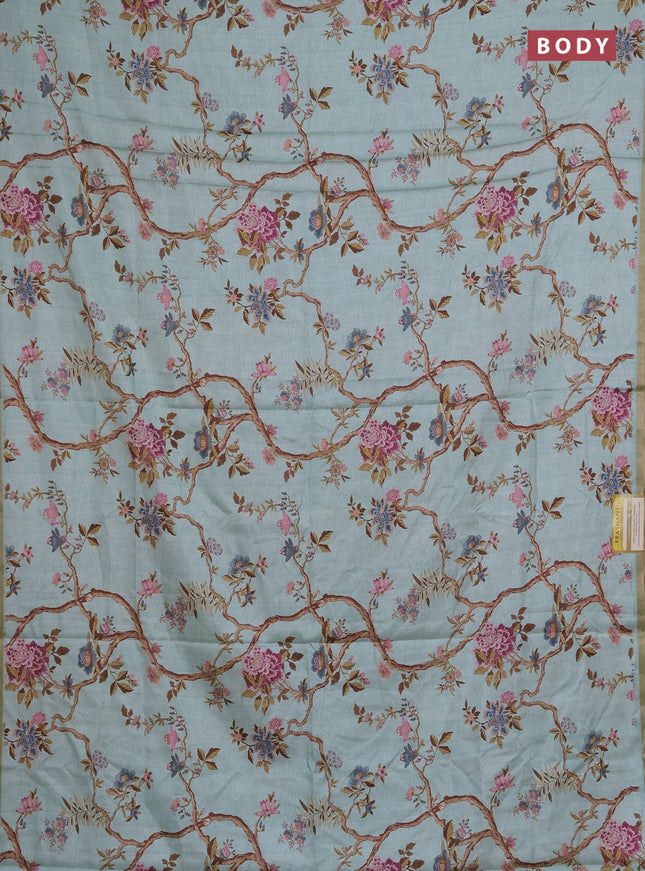 Semi tussar saree mild teal with allover floral digital prints and zari woven piping border