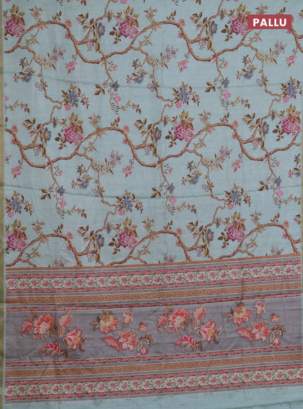 Semi tussar saree mild teal with allover floral digital prints and zari woven piping border