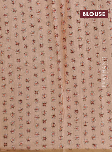 Semi tussar saree peach orange with allover floral digital prints and zari woven piping border