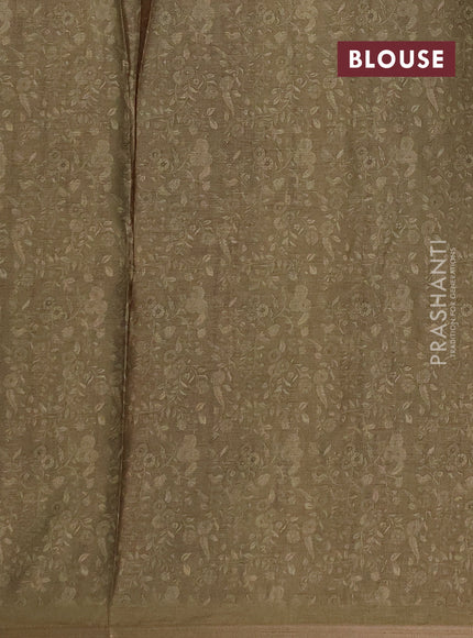 Semi tussar saree mehendi green with allover prints and piping zari woven border