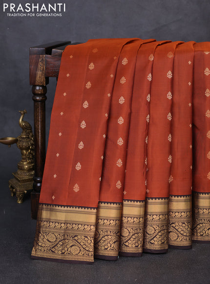 Pure soft silk saree rust shade and coffee brown with allover zari woven buttas and zari woven border