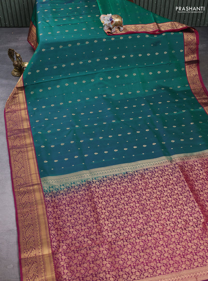 Pure soft silk saree green  and wine shade with allover zari woven buttas and zari woven border