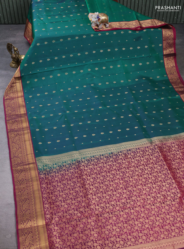Pure soft silk saree green  and wine shade with allover zari woven buttas and zari woven border