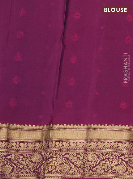 Pure soft silk saree green  and wine shade with allover zari woven buttas and zari woven border