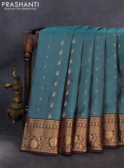 Pure soft silk saree green shade and coffee brown with allover zari woven buttas and zari woven border
