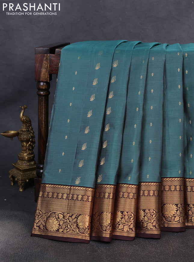 Pure soft silk saree green shade and coffee brown with allover zari woven buttas and zari woven border