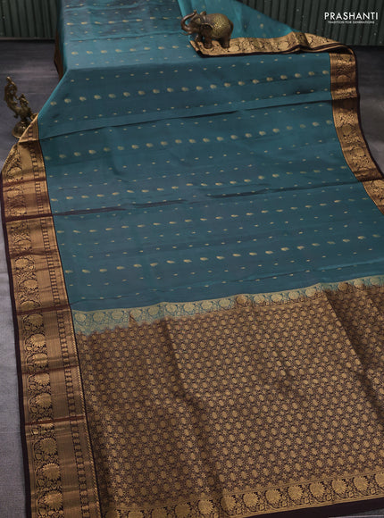 Pure soft silk saree green shade and coffee brown with allover zari woven buttas and zari woven border