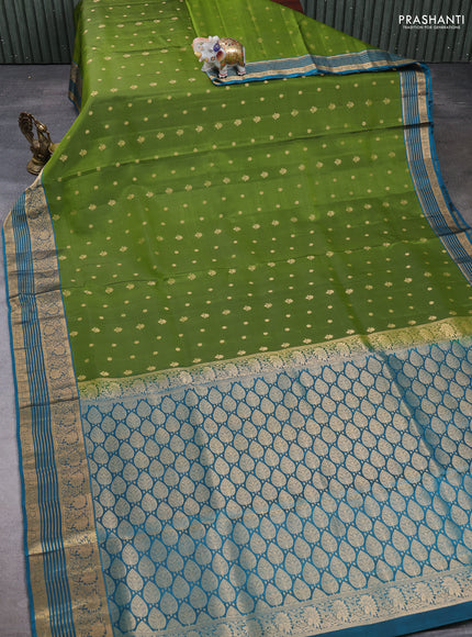 Pure soft silk saree green and peacock blue with allover zari woven buttas and zari woven border