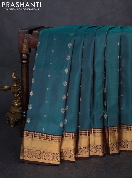 Pure soft silk saree peacock green and coffee brown with allover zari woven buttas and zari woven border