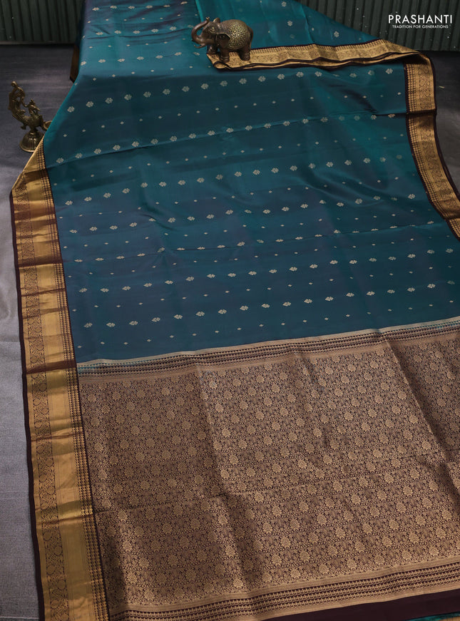 Pure soft silk saree peacock green and coffee brown with allover zari woven buttas and zari woven border