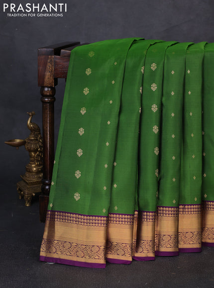 Pure soft silk saree green and purple with allover zari woven buttas and zari woven border