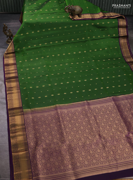 Pure soft silk saree green and purple with allover zari woven buttas and zari woven border