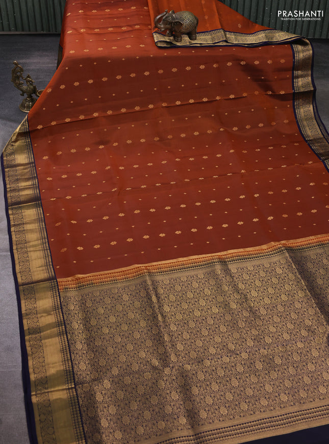 Pure soft silk saree rust shade and navy blue with allover zari woven buttas and zari woven border