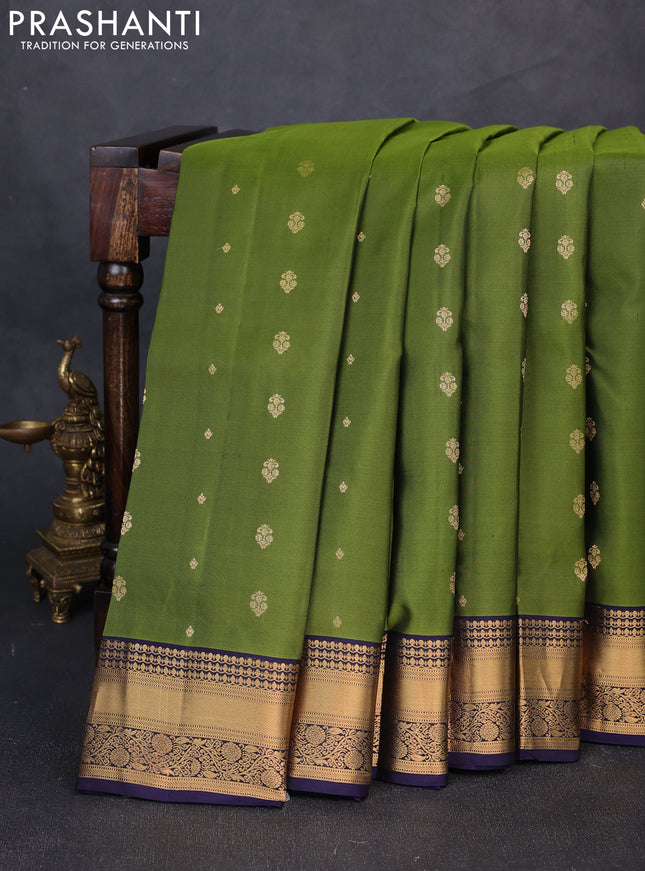Pure soft silk saree mehendi green and navy blue with allover zari woven buttas and zari woven border