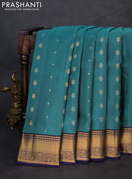 Pure soft silk saree green shade and navy blue with allover zari woven buttas and zari woven border