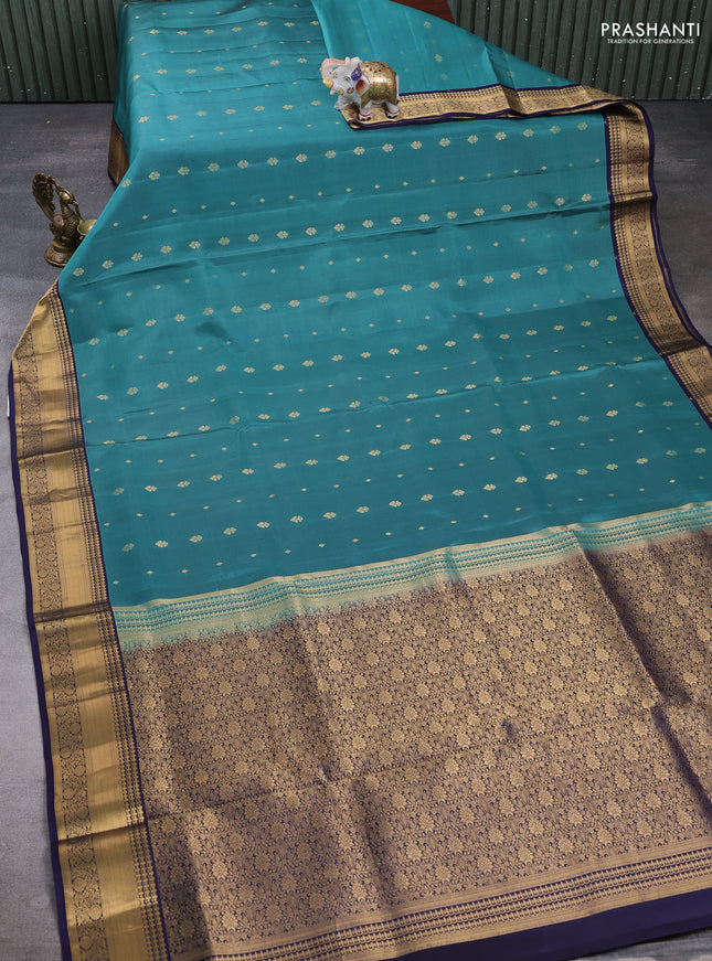 Pure soft silk saree green shade and navy blue with allover zari woven buttas and zari woven border