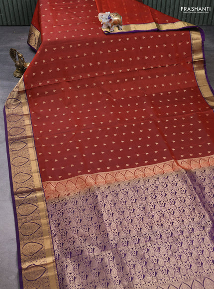 Pure soft silk saree rust shade and violet with allover zari woven buttas and zari woven border