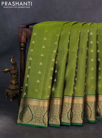 Pure soft silk saree light green and green with allover zari woven buttas and zari woven border