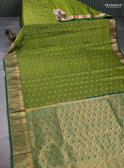 Pure soft silk saree light green and green with allover zari woven buttas and zari woven border