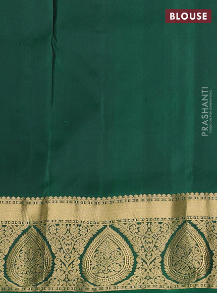 Pure soft silk saree light green and green with allover zari woven buttas and zari woven border