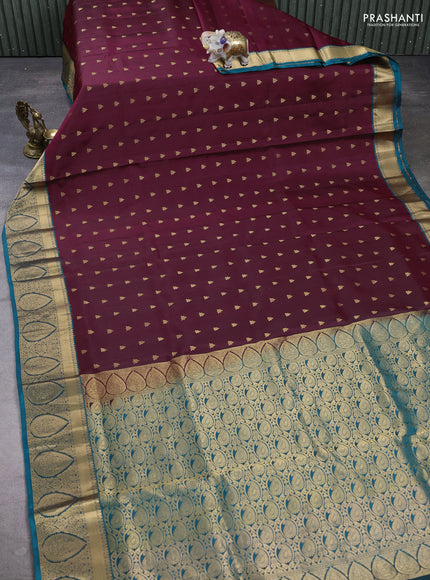 Pure soft silk saree deep wine shade and peacock green with allover zari woven buttas and zari woven border