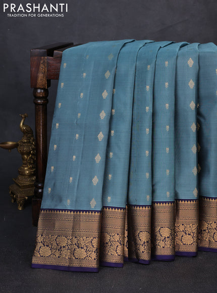 Pure soft silk saree teal shade and navy blue with allover zari woven buttas and zari woven border