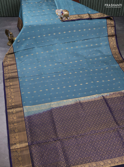 Pure soft silk saree teal shade and navy blue with allover zari woven buttas and zari woven border