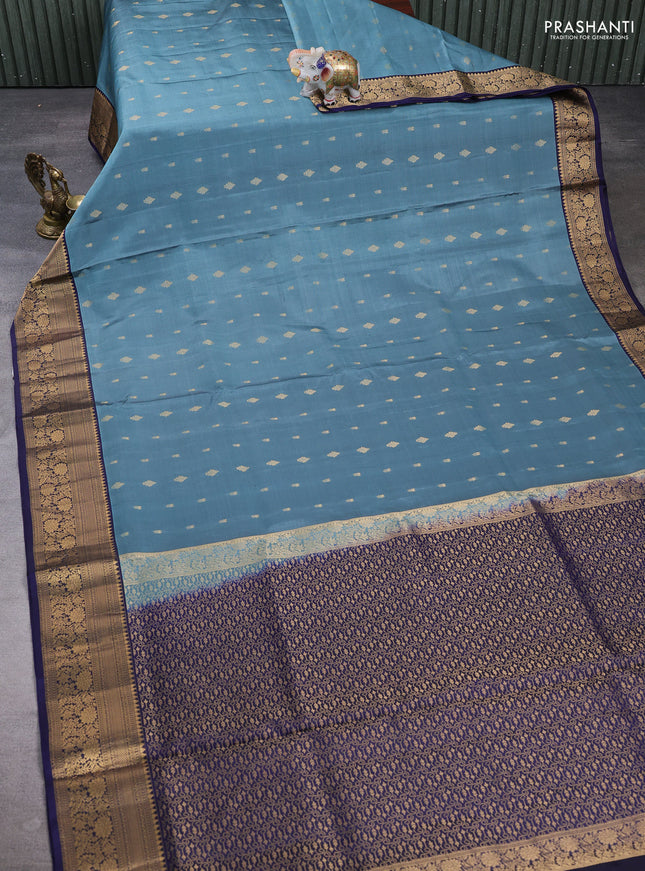 Pure soft silk saree teal shade and navy blue with allover zari woven buttas and zari woven border