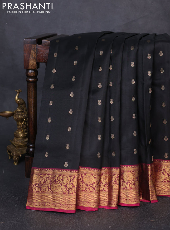 Pure soft silk saree black and magenta pink with allover zari woven buttas and zari woven border