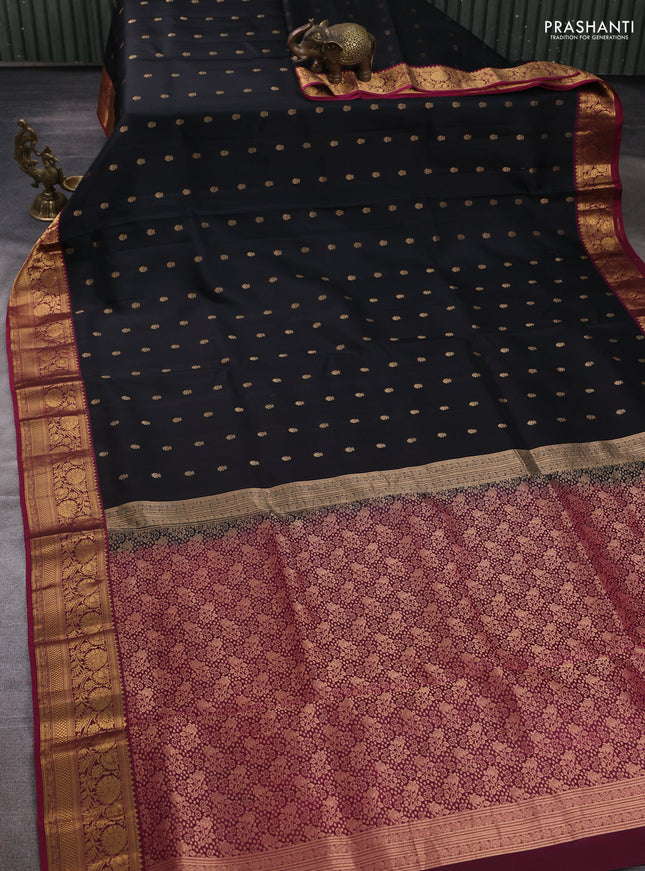 Pure soft silk saree black and magenta pink with allover zari woven buttas and zari woven border