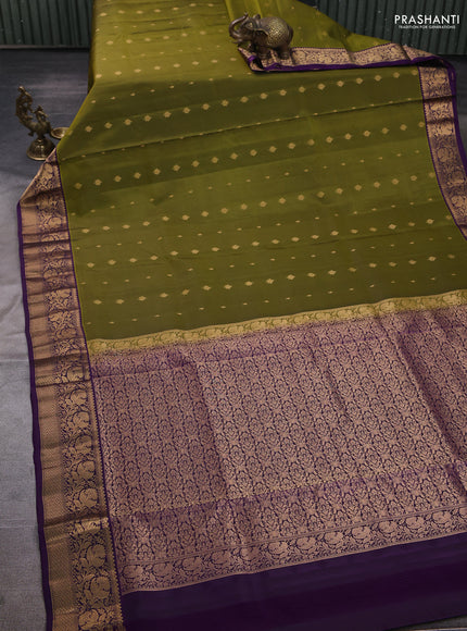 Pure soft silk saree mehendi green and purple with allover zari woven buttas and zari woven border