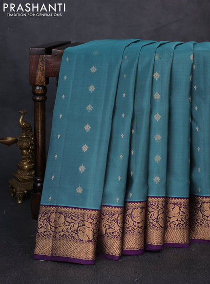 Pure soft silk saree teal shade and violet with allover zari woven buttas and zari woven border
