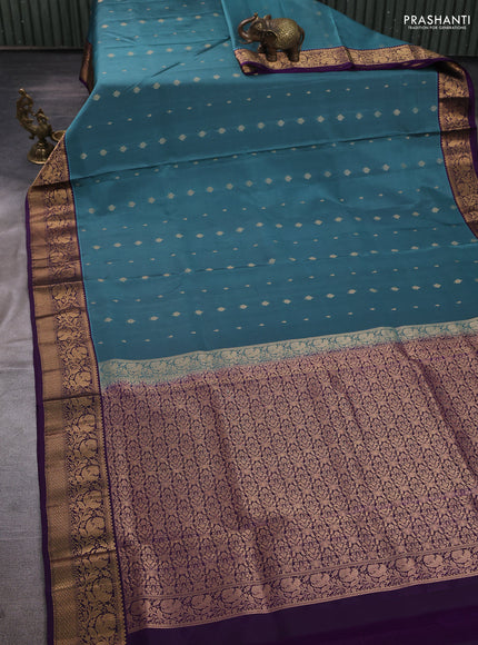 Pure soft silk saree teal shade and violet with allover zari woven buttas and zari woven border