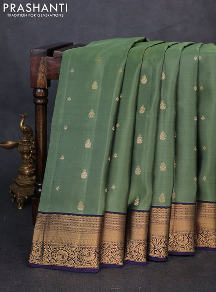 Pure soft silk saree elaichi green and navy blue with allover zari woven buttas and zari woven border