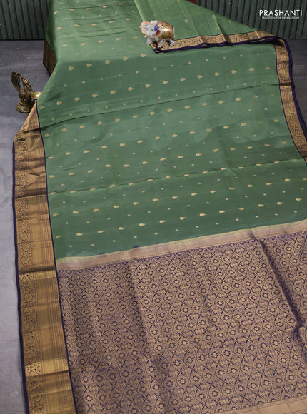 Pure soft silk saree elaichi green and navy blue with allover zari woven buttas and zari woven border