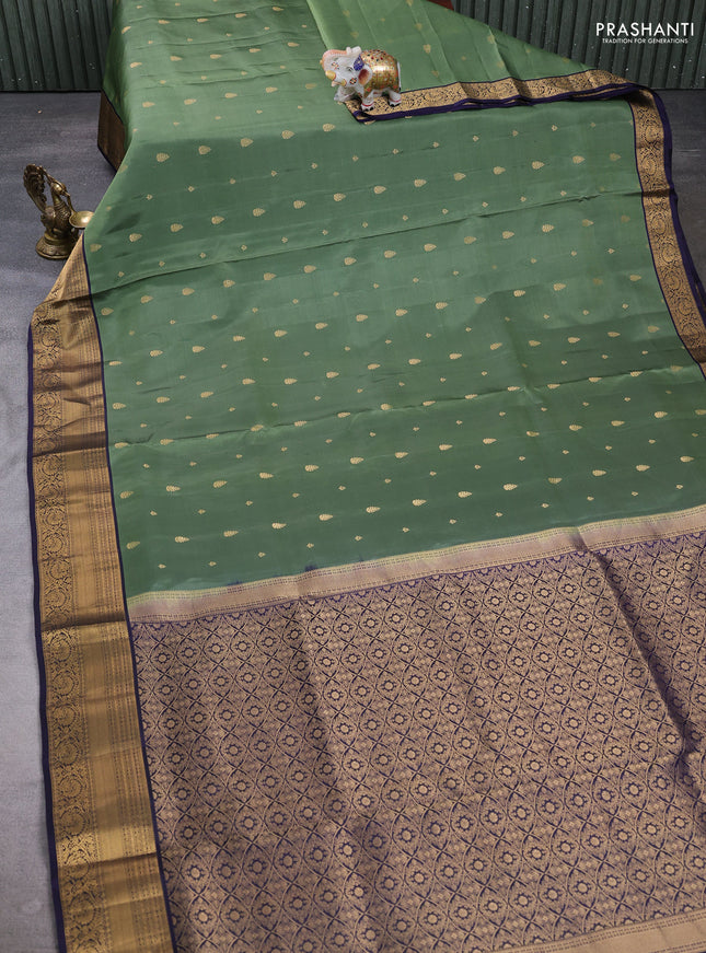 Pure soft silk saree elaichi green and navy blue with allover zari woven buttas and zari woven border