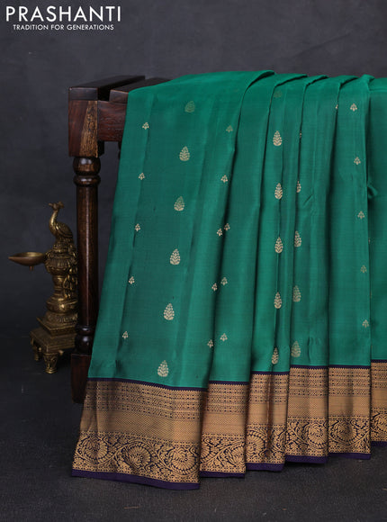 Pure soft silk saree green and navy blue with allover zari woven buttas and zari woven border