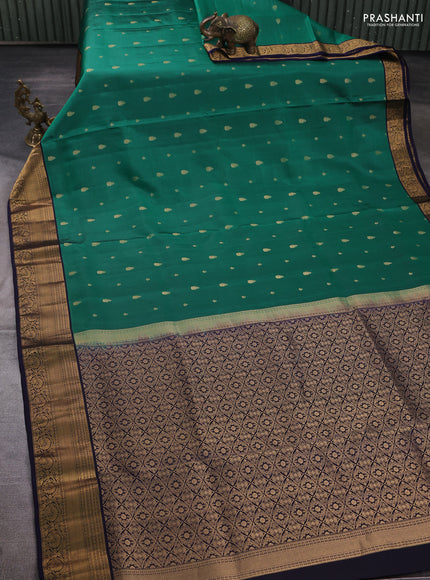 Pure soft silk saree green and navy blue with allover zari woven buttas and zari woven border
