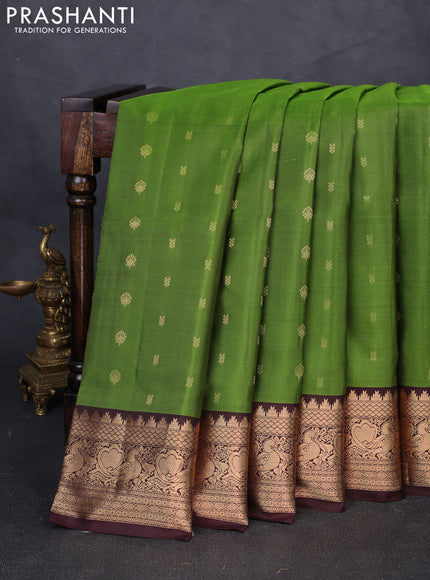 Pure soft silk saree green and coffee brown with allover zari woven buttas and zari woven border