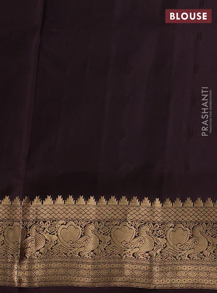 Pure soft silk saree green and coffee brown with allover zari woven buttas and zari woven border