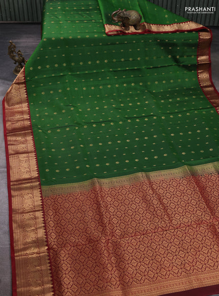 Pure soft silk saree green and maroon with allover zari woven buttas and zari woven border
